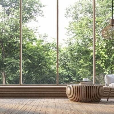 chair sitting in front of large windows